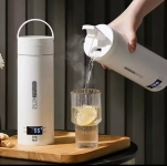 רק 19.7$/66 ש״ח לכוס תרמית חשמלית ניידת בנפח 450 מ״ל עם חימום מובנה, תפריט באנגלית ועיצוב בטיחותי נגד כוויות!!